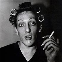 A young man in curlers at home on West 20th Street - Diane Arbus