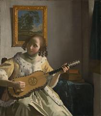 Youg woman playing a guitar - Jan Vermeer