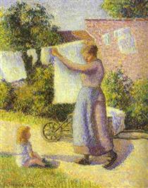 Femme étendant du linge - Camille Pissarro